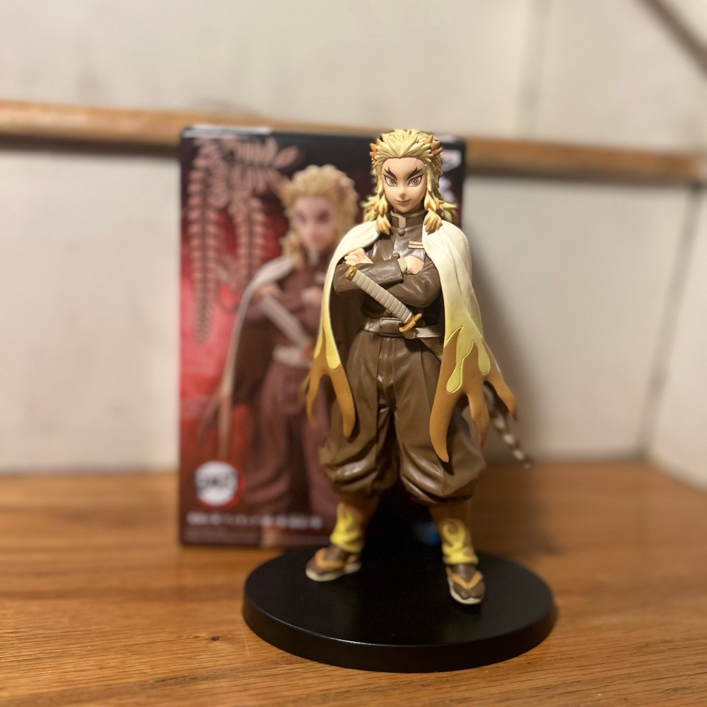 Anime Character Figurine with Flame Cape
